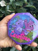 Load image into Gallery viewer, Whimsical Purple and Red Resin Coasters with Care Bear Theme
