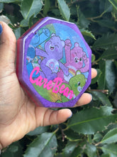 Load image into Gallery viewer, Whimsical Purple and Red Resin Coasters with Care Bear Theme
